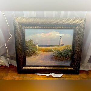 cute but has a chip in the corner of the frame.